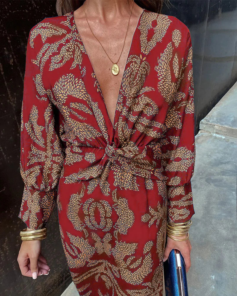 דינקה | שמלת פרחים אלגנטית עם שרוולים ארוכים